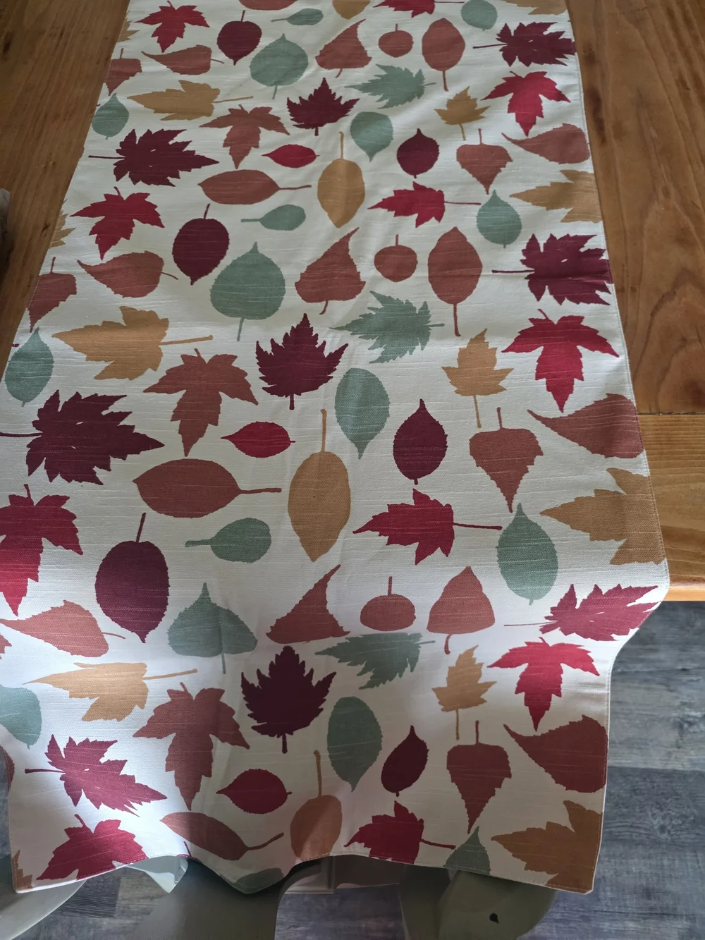 Leaf Pattern Table Runner in Cream with Red, Green & Tan Accents